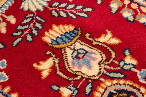 Backside of handmade 1990s Kerman rug showing knot structure and weave density
