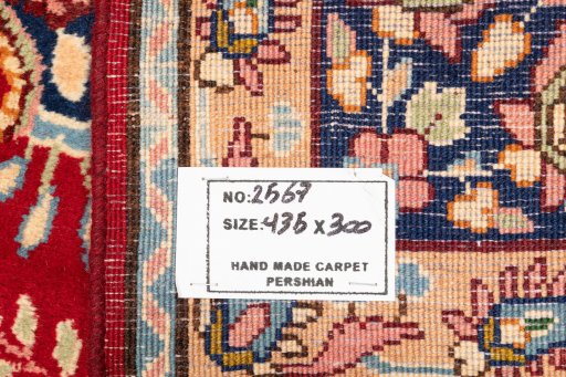 Close-up detail of 1990s Kerman rug from Iran / Persia showing Wool weave