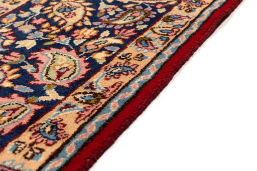Close-up detail of 1990s Kerman rug from Iran / Persia showing Wool weave