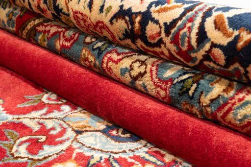 Surface texture of 1990s Kerman rug with natural Wool and intricate pattern