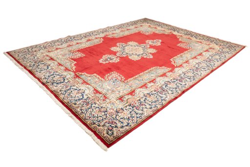 Corner detail of 1990s Kerman rug showing border pattern and Wool pile