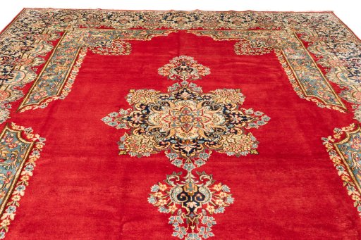 Full view of 1990s Kerman rug from Iran / Persia, 405 × 300 cm in Red tones