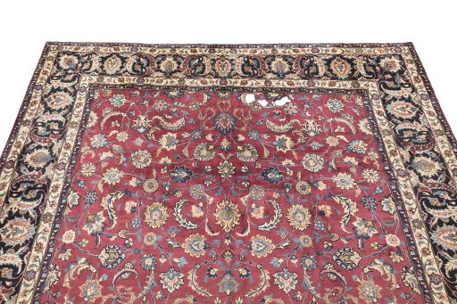 Surface texture of 1960s Mashad rug with natural Wool and intricate pattern