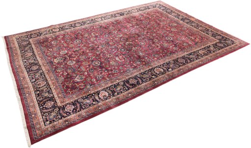 Corner detail of 1960s Mashad rug showing border pattern and Wool pile