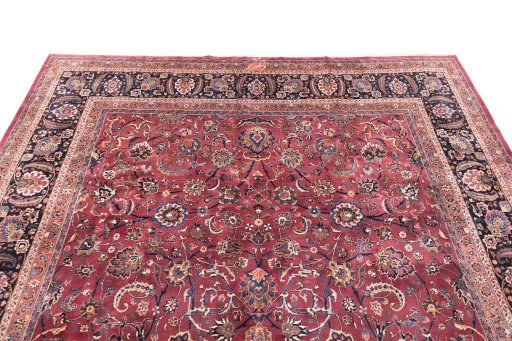 Surface texture of 1960s Mashad rug with natural Wool and intricate pattern