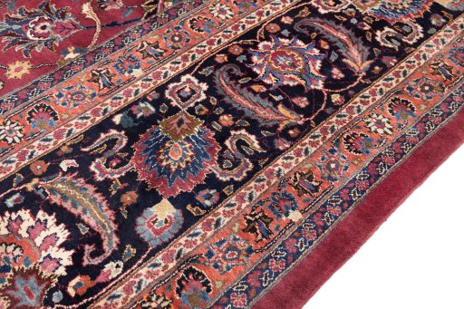 Full view of 1960s Mashad rug from Iran / Persia, 500 × 353 cm in Red tones