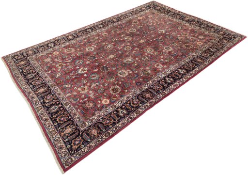 Corner detail of 1960s Mashad rug showing border pattern and Wool pile