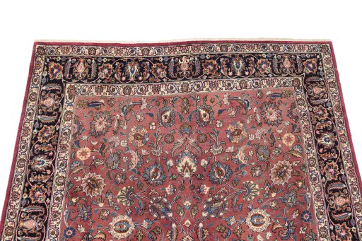 Surface texture of 1960s Mashad rug with natural Wool and intricate pattern