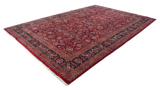 Corner detail of 1960s Mashad rug showing border pattern and Wool pile