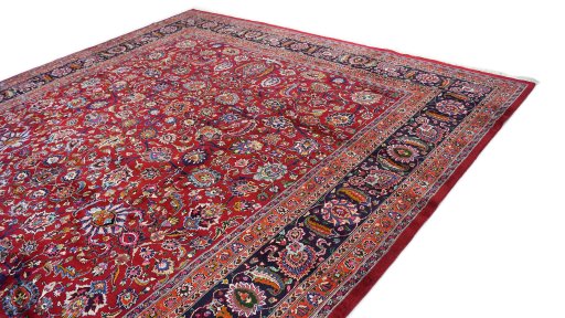 Surface texture of 1960s Mashad rug with natural Wool and intricate pattern