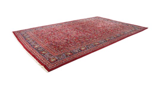 Corner detail of 1960s Mashad rug showing border pattern and Wool pile