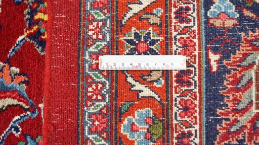 Full view of 1960s Mashad rug from Iran / Persia, 482 × 301 cm in Dark red tones