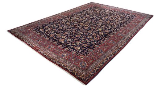 Corner detail of 1960s Mashad rug showing border pattern and Wool pile