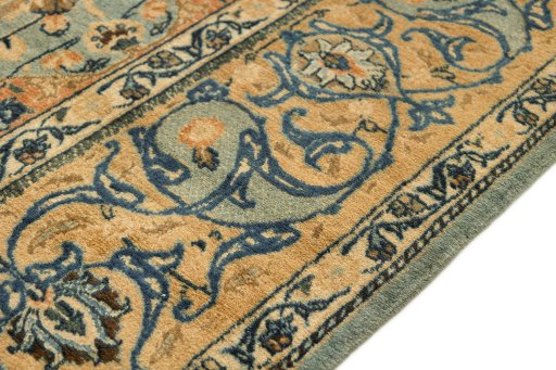 Close-up detail of 1980s Mashad rug from Iran / Persia showing Wool weave
