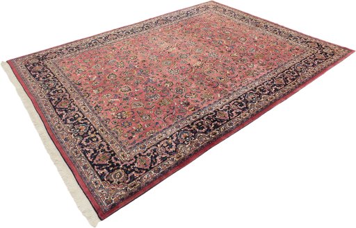 Corner detail of 1960s Mashad rug showing border pattern and Wool pile