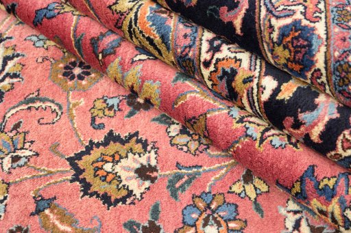 Close-up detail of 1960s Mashad rug from Iran / Persia showing Wool weave