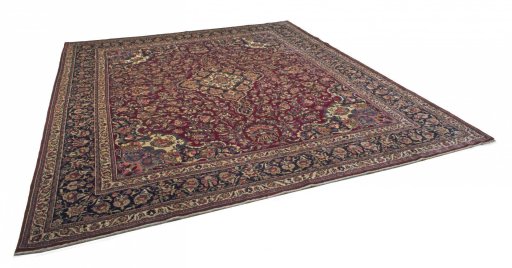 Corner detail of 1970s Mashad rug showing border pattern and Wool pile