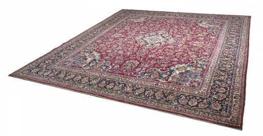 Close-up detail of 1970s Mashad rug from Iran / Persia showing Wool weave