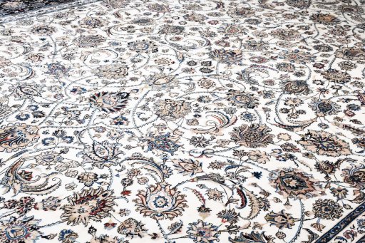 Corner detail of New Mashad rug showing border pattern and Wool pile