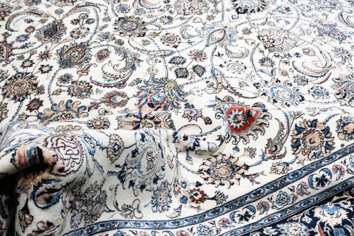 Close-up detail of New Mashad rug from Iran / Persia showing Wool weave