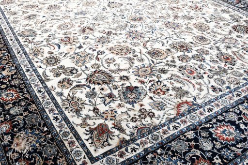 Close-up detail of New Mashad rug from Iran / Persia showing Wool weave