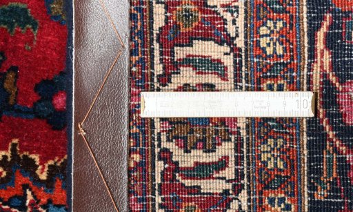 Central medallion detail of 1950s Mashad rug from Iran / Persia