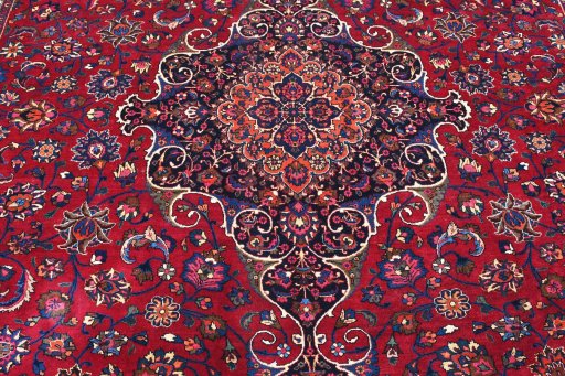 Central medallion detail of 1950s Mashad rug from Iran / Persia