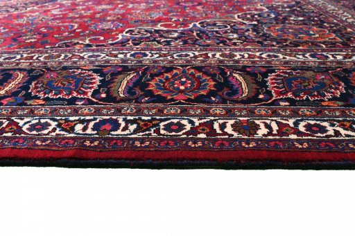 Close-up detail of 1950s Mashad rug from Iran / Persia showing Wool weave