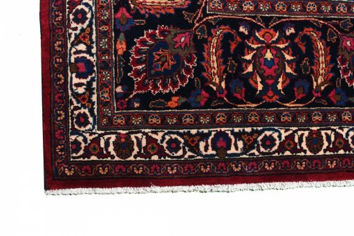 Full view of 1950s Mashad rug from Iran / Persia, 385 × 290 cm in Red tones