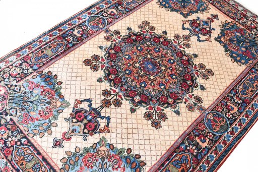 Surface texture of 1950s Mashad rug with natural Wool and intricate pattern