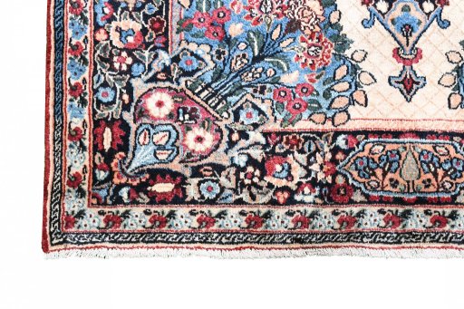 Central medallion detail of 1950s Mashad rug from Iran / Persia