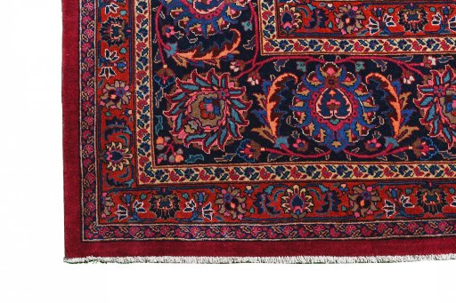 Full view of 1950s Mashad rug from Iran / Persia, 465 × 370 cm in Red tones