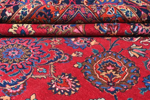 Close-up detail of 1950s Mashad rug from Iran / Persia showing Wool weave