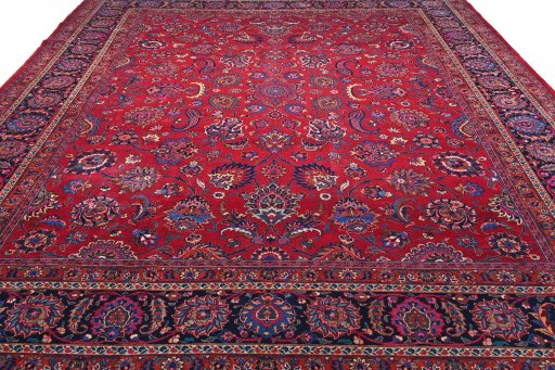 Surface texture of 1950s Mashad rug with natural Wool and intricate pattern