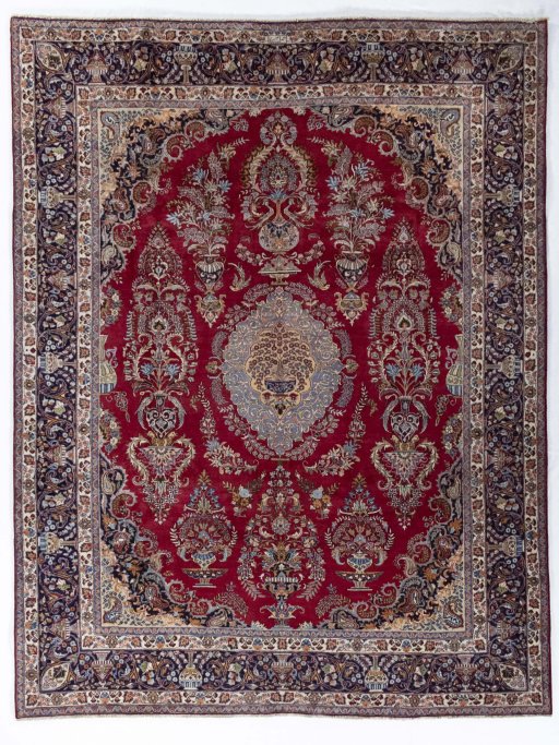 Full view of 1970s Mashad rug from Iran / Persia, 387 × 300 cm in Red tones
