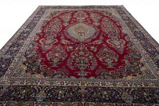 Surface texture of 1970s Mashad rug with natural Wool and intricate pattern
