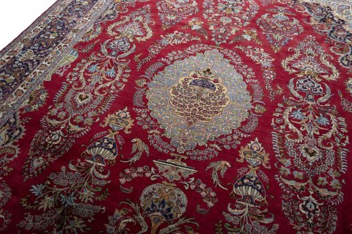 Backside of handmade 1970s Mashad rug showing knot structure and weave density