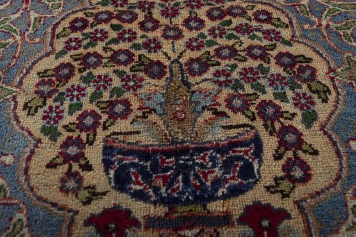 Close-up detail of 1970s Mashad rug from Iran / Persia showing Wool weave