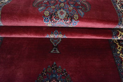 Corner detail of 1950s Mashad rug showing border pattern and Wool pile