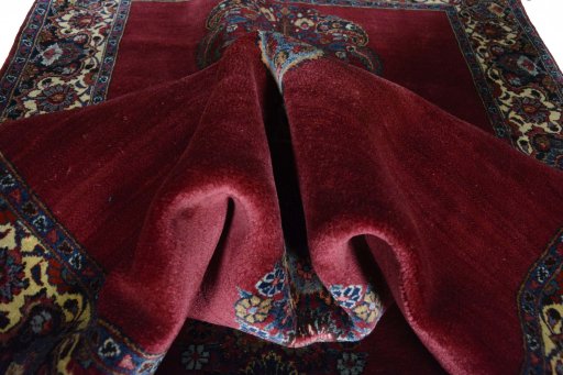 Close-up detail of 1950s Mashad rug from Iran / Persia showing Wool weave