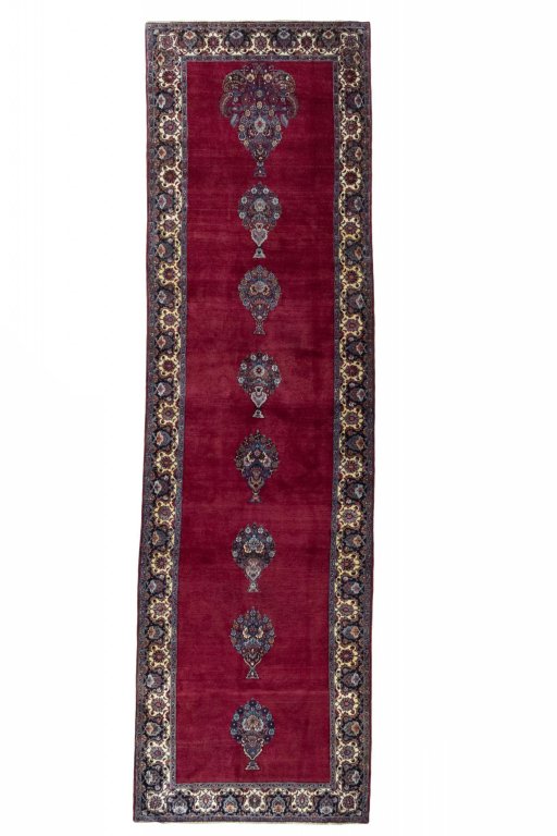 Full view of 1950s Mashad rug from Iran / Persia, 480 × 137 cm in Red tones