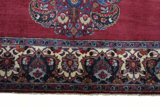 Close-up detail of 1950s Mashad rug from Iran / Persia showing Wool weave
