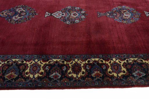 Full view of 1950s Mashad rug from Iran / Persia, 480 × 137 cm in Red tones