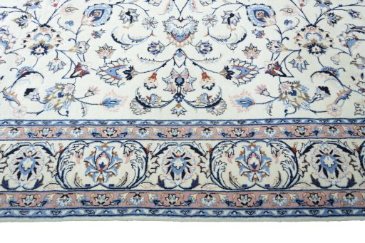 Corner detail of New Mashad rug showing border pattern and Wool pile