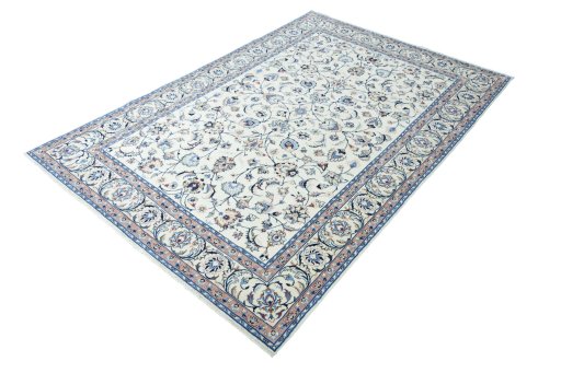 Corner detail of New Mashad rug showing border pattern and Wool pile