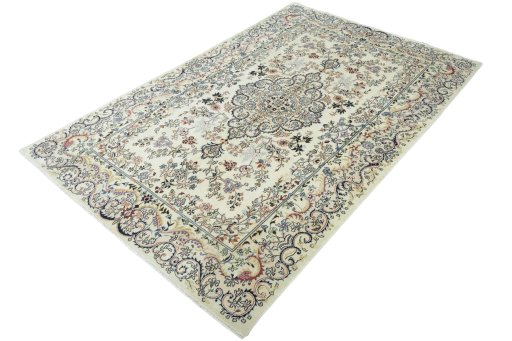 Corner detail of New Mashad rug showing border pattern and Wool pile