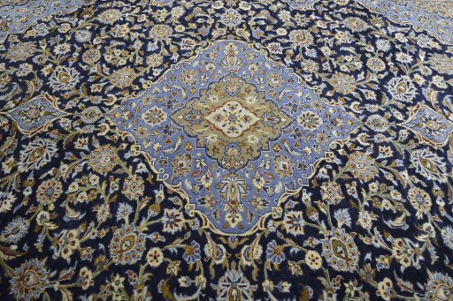 Central medallion detail of 2000s Mashad rug from Iran / Persia
