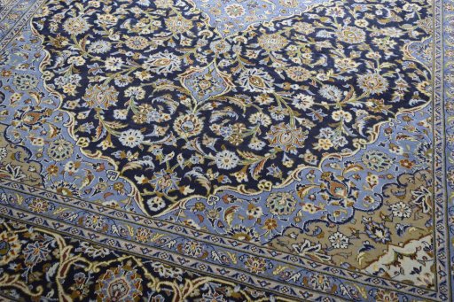 Close-up detail of 2000s Mashad rug from Iran / Persia showing Wool weave