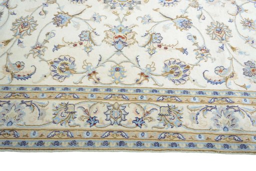 Corner detail of New Mashad rug showing border pattern and Wool pile