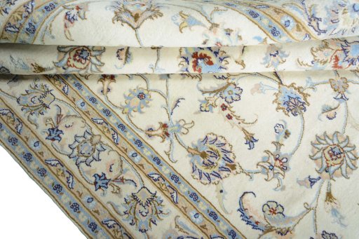 Close-up detail of New Mashad rug from Iran / Persia showing Wool weave